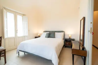 Letto o letti in una camera di Villa dei Cedri
