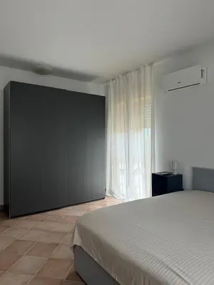 Letto o letti in una camera di Casa Galatea