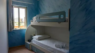 Letto o letti in una camera di Teresan Homestay