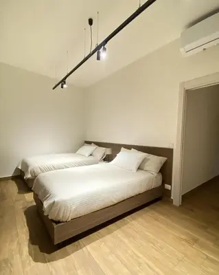 Letto o letti in una camera di Primo Piano Acireale - Room & Relax