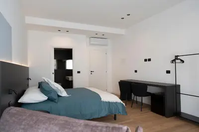 Letto o letti in una camera di Primo Piano Acireale - Room & Relax
