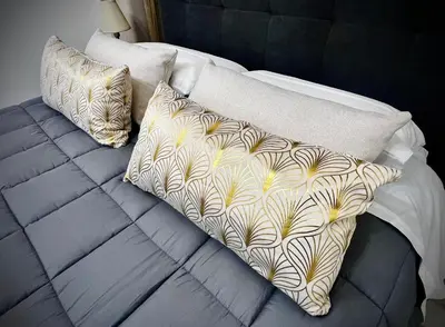 Letto o letti in una camera di Exclusive and reserved suite, secure parking