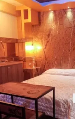 Letto o letti in una camera di Wellhomeluxury