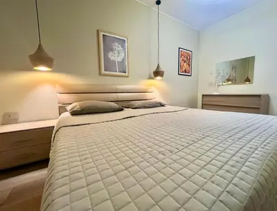 Letto o letti in una camera di Paradiso House