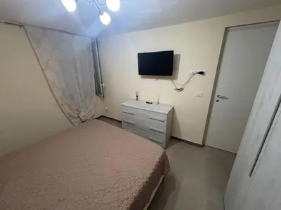 Letto o letti in una camera di Donna Tina