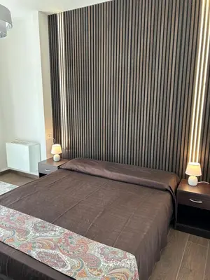 Letto o letti in una camera di Villa Adele d'Edmondo