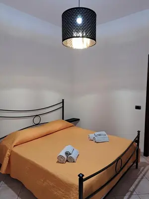 Letto o letti in una camera di La Piuma