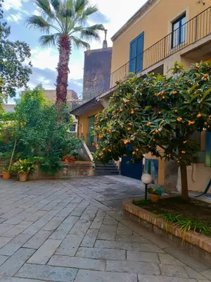 Giardino di Il Nespolino - Boutique Rooms
