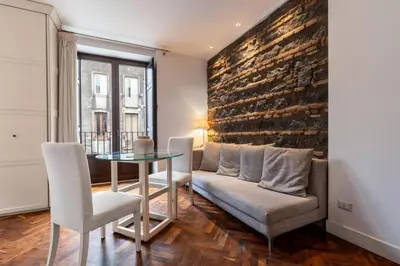 Area soggiorno di GuestHost - Mediterranean Home - Central Cozy Studio in Catania