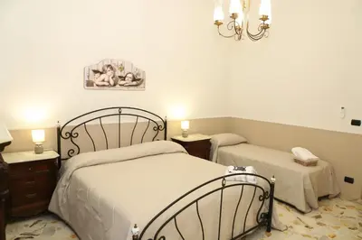 Letto o letti in una camera di Paradiso dell'Etna