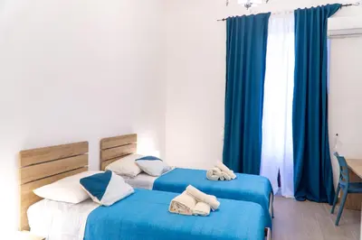 Letto o letti in una camera di Maran'Atha
