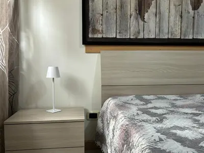 Letto o letti in una camera di Marea Home