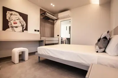 Letto o letti in una camera di Sapore di sale