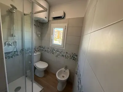 Bagno di Heroes Apartments Sea