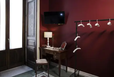 TV o dispositivi per l'intrattenimento presso Art Fashion House Luxury Rooms