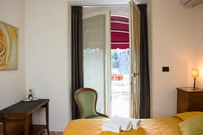 Letto o letti in una camera di B&B I Licutiani