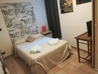 Letto o letti in una camera di B&B I Licutiani