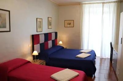 Letto o letti in una camera di L'elefante
