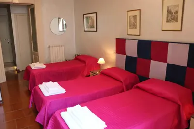 Letto o letti in una camera di L'elefante