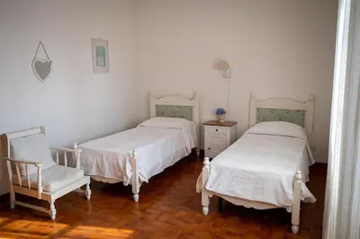 Letto o letti in una camera di Villa Iolanda-Sive Natura Wine&House