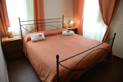 Letto o letti in una camera di B&B San Leonardo