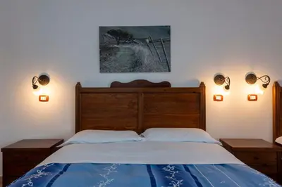 Letto o letti in una camera di Agriturismo dell'Etna