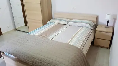 Letto o letti in una camera di Appartamenti Sole delle Aci
