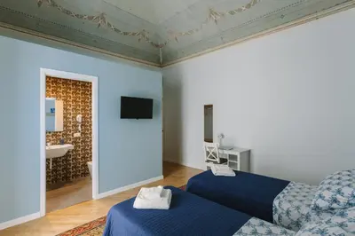 Letto o letti in una camera di Mungibeddu Organic Bed and Breakfast