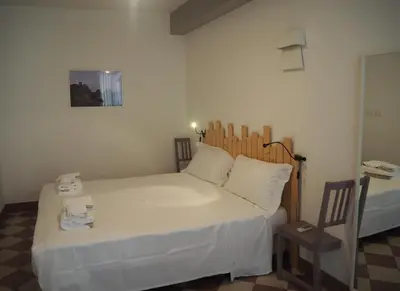 Letto o letti in una camera di Tambù Apartments