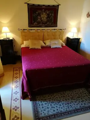 Letto o letti in una camera di B&B Palazzo Gambino