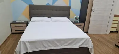 Letto o letti in una camera di B&B Mongibello
