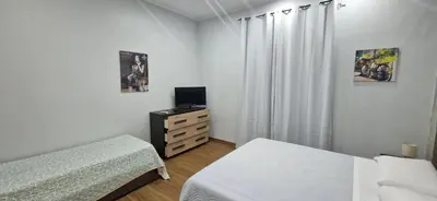 Letto o letti in una camera di B&B Mongibello
