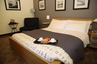 Letto o letti in una camera di Casa Barbero Charme & Rooms