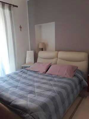 Letto o letti in una camera di Casa delle Aci