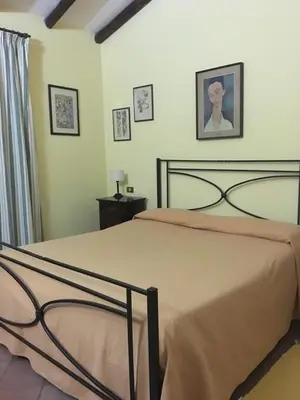 Letto o letti in una camera di Agriturismo Masseria Portiere Stella