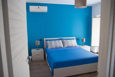 Letto o letti in una camera di Enjoy Home