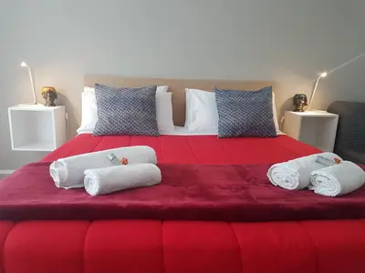 Letto o letti in una camera di GiglioApartment Etna Mare