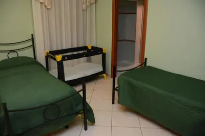 Letto o letti in una camera di B&B Villa San Leonardo