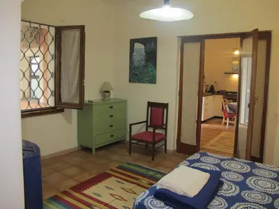 Letto o letti in una camera di Casa Amaryllis