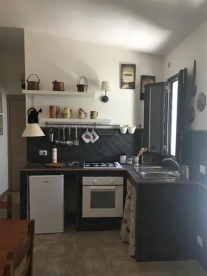 Cucina o angolo cottura di Nzina Maison de Charme