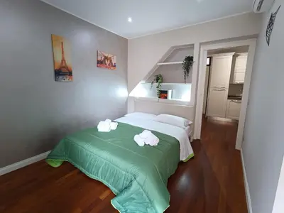 Letto o letti in una camera di Cortile dei Sogni