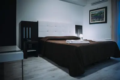 Letto o letti in una camera di Hotel Casale dei Greci