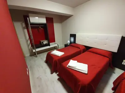 Letto o letti in una camera di Hotel Casale dei Greci