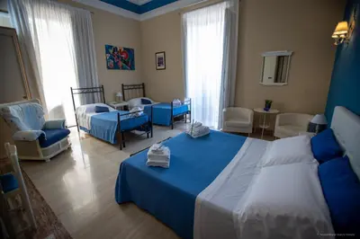 Letto o letti in una camera di B&B Sicily Luxury