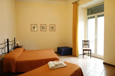 Letto o letti in una camera di B&B Del Corso