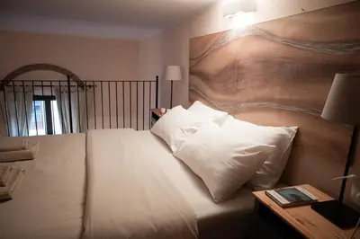 Letto o letti in una camera di Etna Home