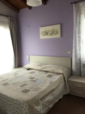 Letto o letti in una camera di Il Tiglio