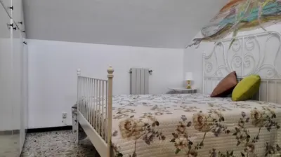 Letto o letti in una camera di Lucrezia Garden Catania