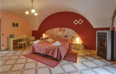 Letto o letti in una camera di La Perla