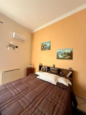 Letto o letti in una camera di B&B L' Aquila dell' Etna